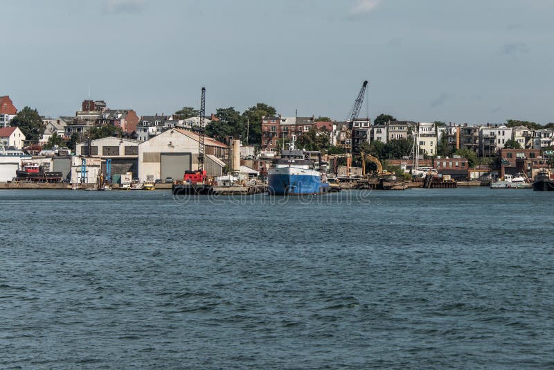 View of harbor from the old Boston Waterfront with fishing boat trucks and boats anchored Massachusets royalty free stock photos View of harbor from the old Boston Waterfront with fishing boat trucks and boats anchored Massachusets royalty free stock photos