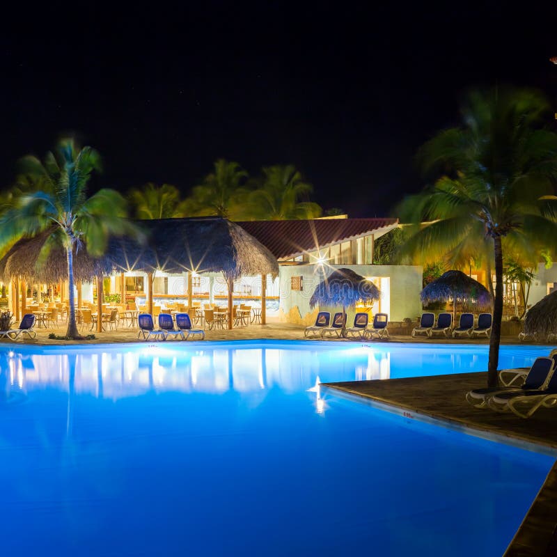 View of hotel and swimming pool at night