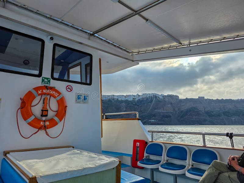 Greece, Santorini, August 31st 2025 - View from of the iconic Santorini cliffs from the deck of a cruise ship tender royalty free stock image