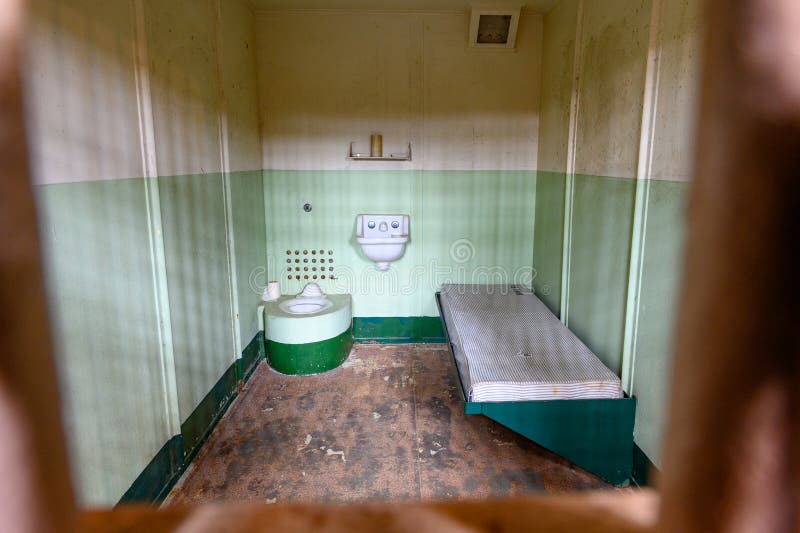 A view inside of Alcatraz prison showing a prison cell. A view inside of Alcatraz prison showing a prison cell.