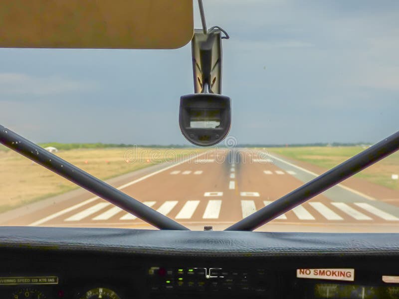 View Inside pilot cabin to aerodrome stock images