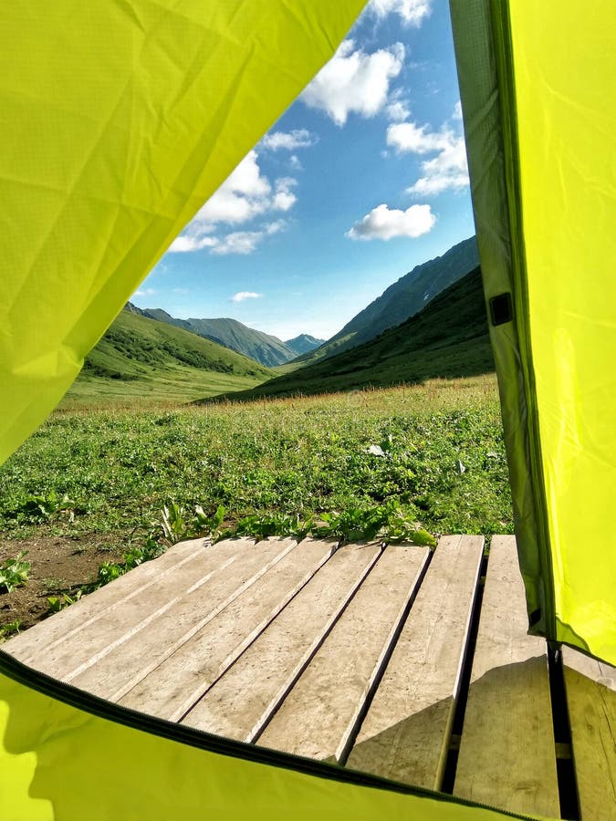 View from inside of yellow camping tent stock images View from inside of yellow camping tent stock images