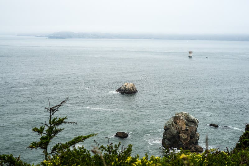 The view in Lands End, San Francisco. summer , cloud , rock , sea, plant.