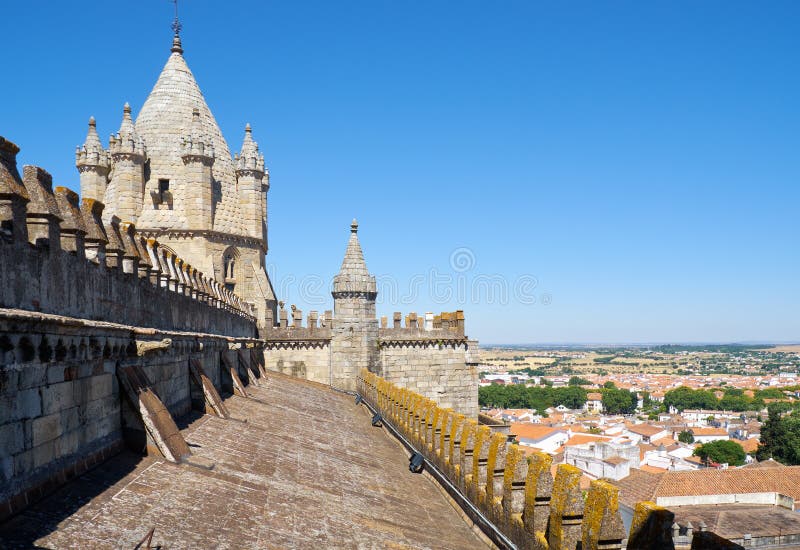 Tower over the gable roof of Evora Cathedral (Basilica Cathedral of Our Lady of Assumption). Evora. Portugal royalty free stock photography Tower over the gable roof of Evora Cathedral (Basilica Cathedral of Our Lady of Assumption). Evora. Portugal royalty free stock photography