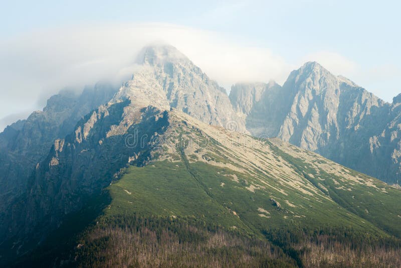 Lomnicky Stit peak covered in clouds in High Tatra Mountains, Slovakia