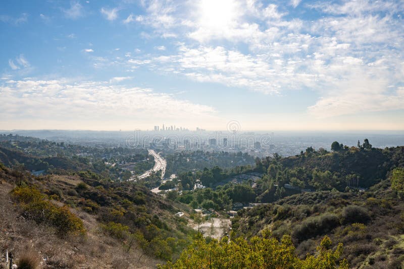 View of Los Angeles from the Hollywood Hills. Down Town LA. Hollywood Bowl. Warm sunny day. Beautiful clouds in blue sky