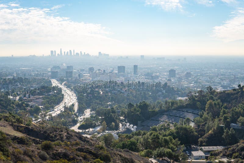 View of Los Angeles from the Hollywood Hills. Down Town LA. Hollywood Bowl. Warm sunny day. Beautiful clouds in blue sky