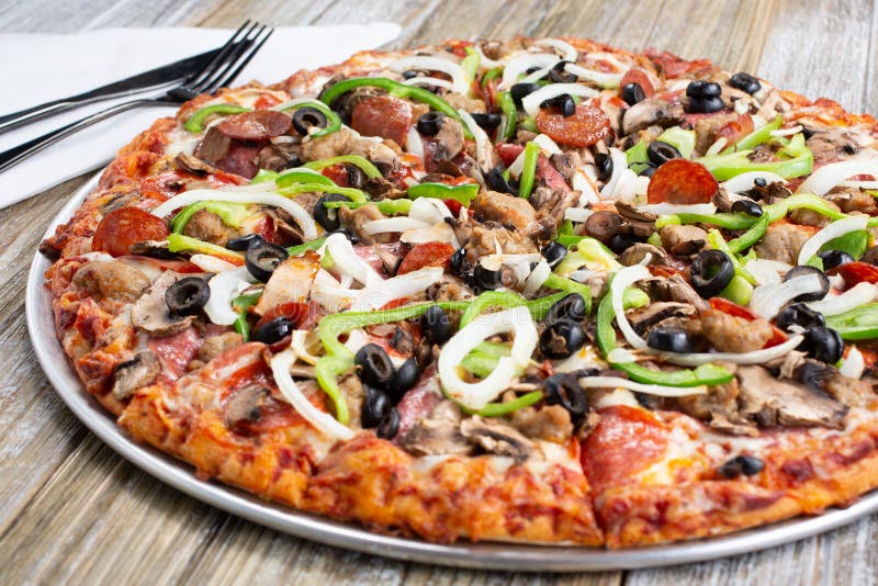 Meat and veg pizza stock image. Image of drink, ingredient 192748119