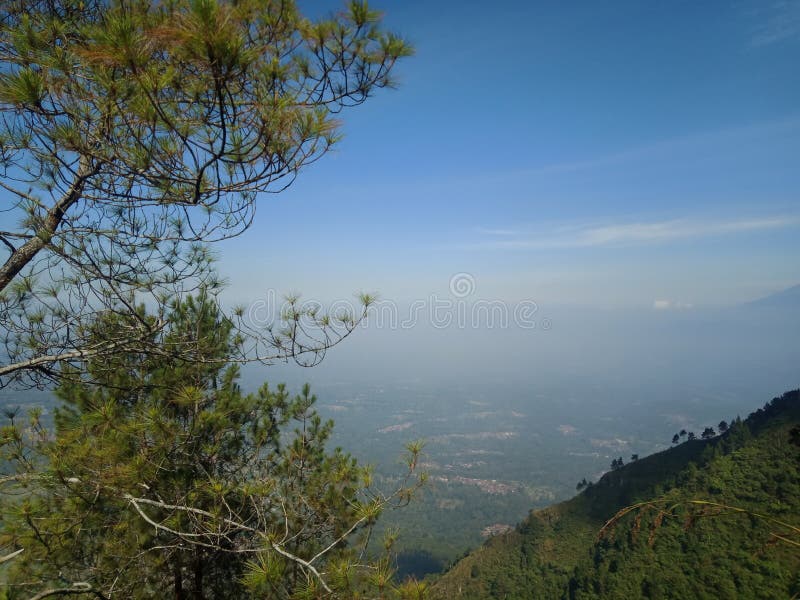The view of merbabu mountain from the top of mount andong. 01 june 2023 : beautiful view of the mountain stock image