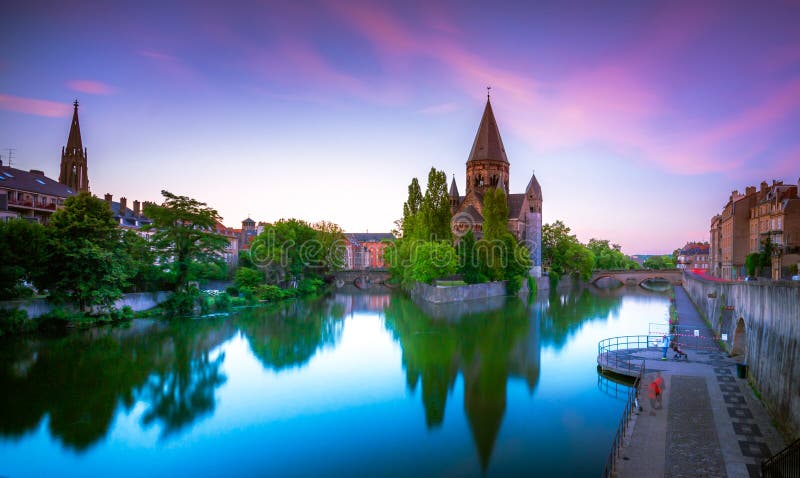 View of Metz with Temple Neuf reflected in the Moselle River, Lorraine. royalty free stock photos View of Metz with Temple Neuf reflected in the Moselle River, Lorraine. royalty free stock photos