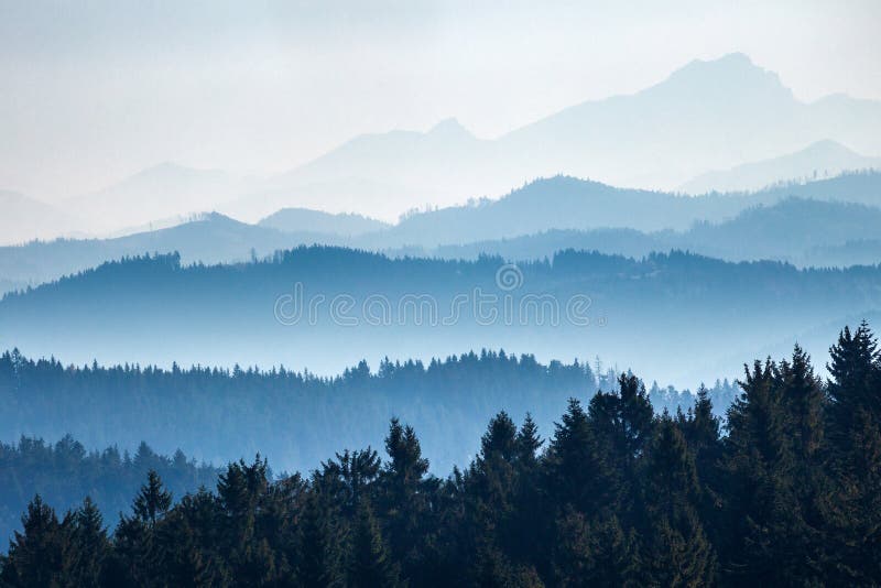 View of mountain ridges separated by aerial perspective stock photo View of mountain ridges separated by aerial perspective stock photo
