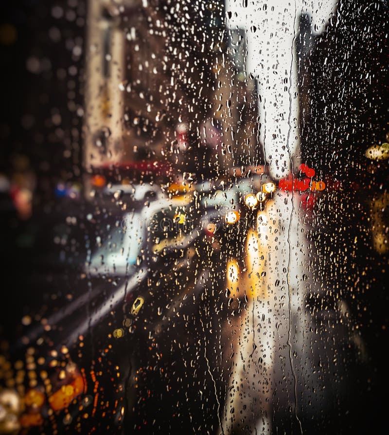 view new york city rainy evening blurred street background waterdrops lights cars raining time 78373474