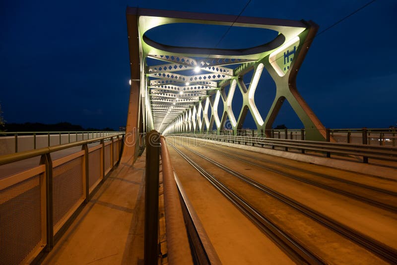 View of the old bridge over the Danube river in Bratislava at night