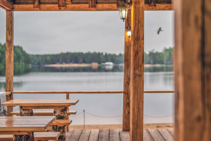 View from an Outdoor Cafe on the Background of a Forest Lake Stock
