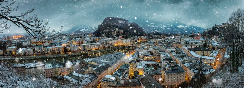 View over the city of Salzburg, Austria with falling snow stock photography View over the city of Salzburg, Austria with falling snow stock photography
