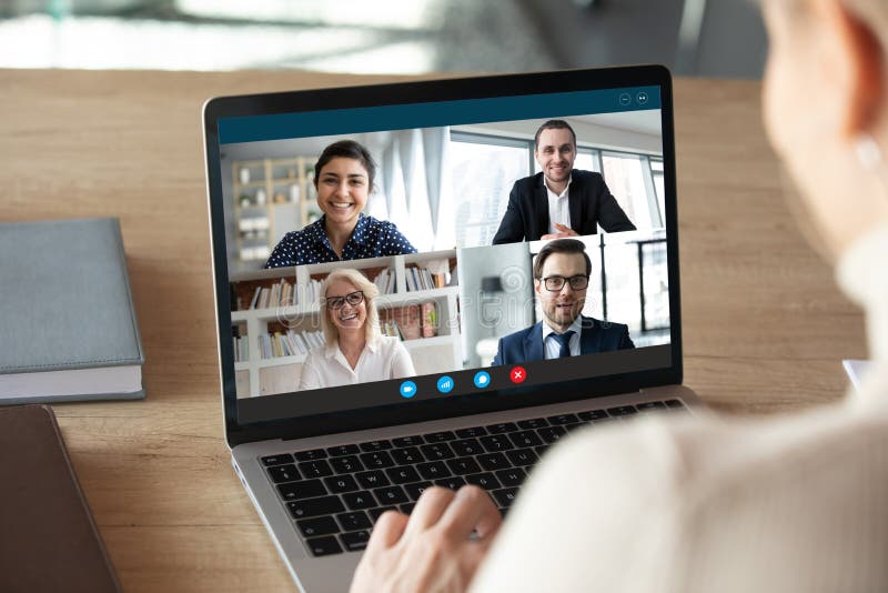 Computer screen view diverse businesspeople negotiating distantly using videocall stock photography