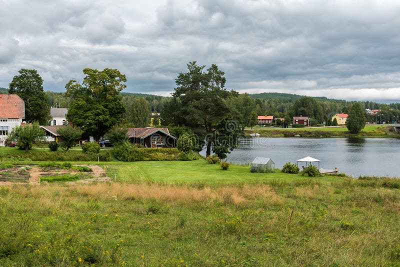 View over the Swedish countryside around Segersta with Agricultural fields, trees, grass and wheetfields, Segersta, Sweden. View over the Swedish countryside around Segersta with Agricultural fields, trees, grass and wheetfields, Segersta, Sweden