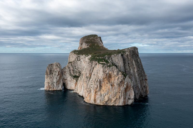 View of the Pan Di Zucchero Sea Stack in Porto Flavia on Sardinia Stock