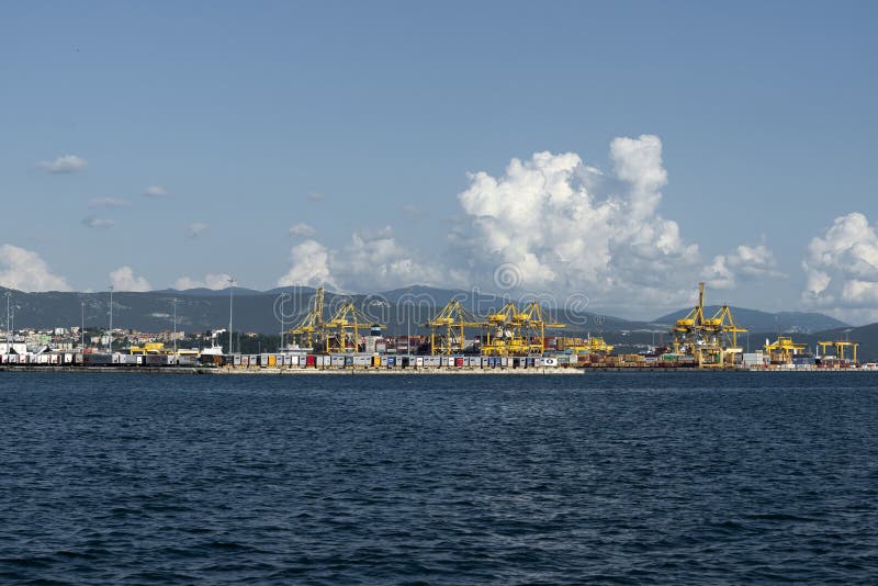 View of Pier VII of the Port of Trieste with cranes for loading:unloading containers royalty free stock photo