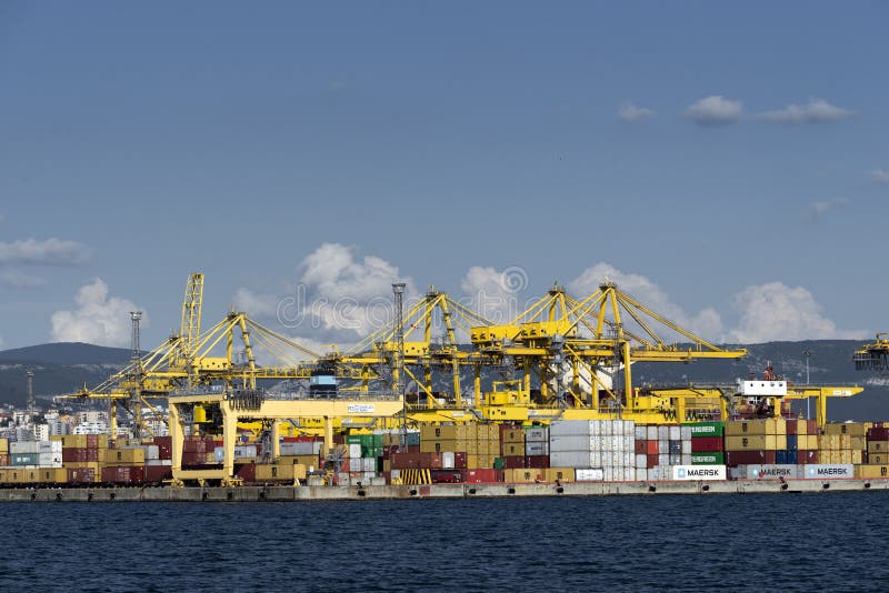 View of Pier VII of the Port of Trieste with cranes for loading:unloading containers royalty free stock photo