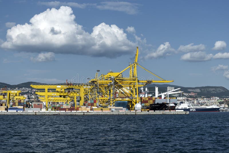 View of Pier VII of the Port of Trieste with cranes for loading:unloading containers royalty free stock photos