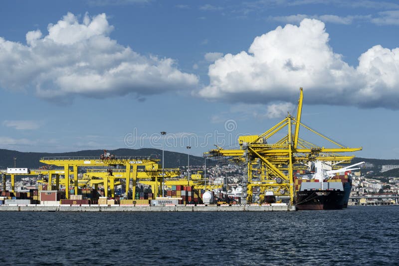 View of Pier VII of the Port of Trieste with cranes for loading:unloading containers royalty free stock images