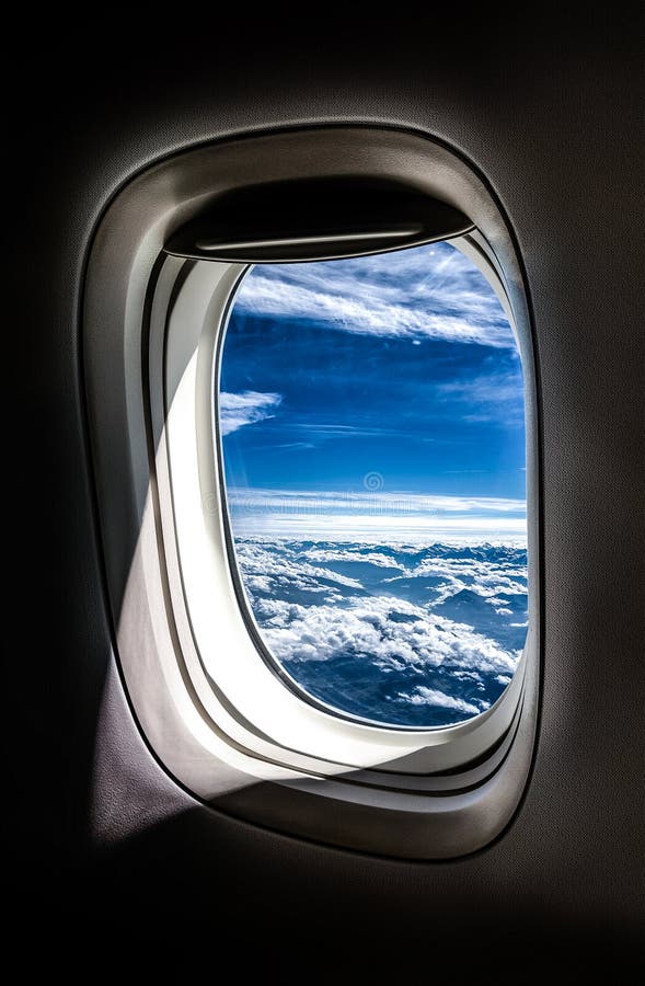 Fotografie pohled z letadla okna někde nad Francií.