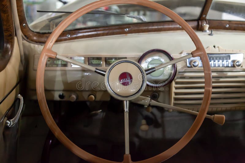 View from Rear Seat on the Steering Wheel and the Interior of the Old