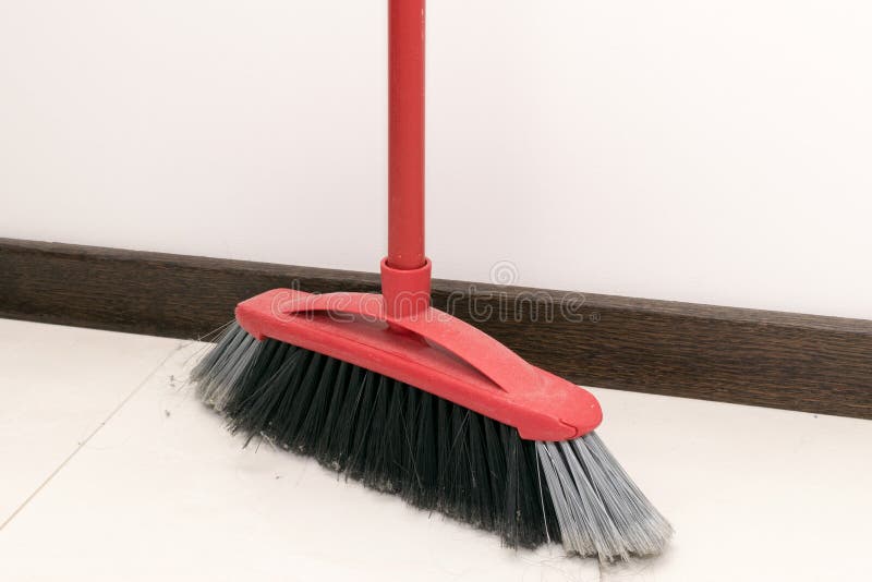 View of the Red Sweeping Brush in the Kitchen Stock Photo Image of