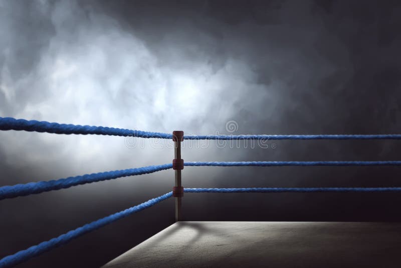 View of a regular boxing ring surrounded by blue ropes stock images