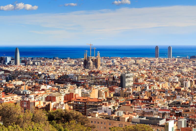 View of Sagrada Familia and Agbar Tower from Park Guell. Barcelona, Spain.