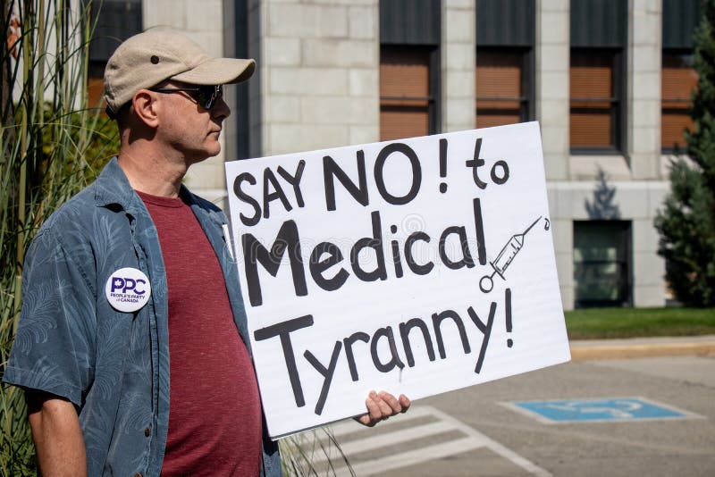 View of sign Say No to Medical Tyranny during the rally against the BC Vaccine Card in front of Vancouver City Hall