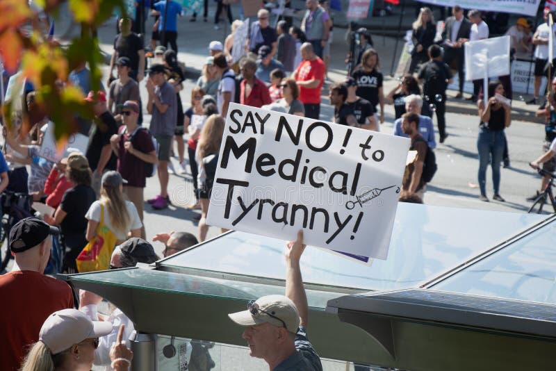 View of sign Say No to Medical Tyranny during the rally against the BC Vaccine Card in front of Vancouver City Hall