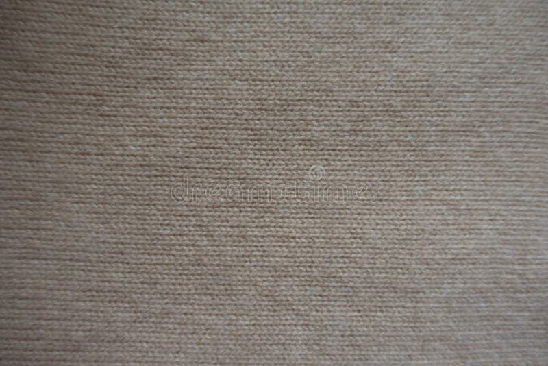 View of simple beige knitted fabric stock images View of simple beige knitted fabric stock images