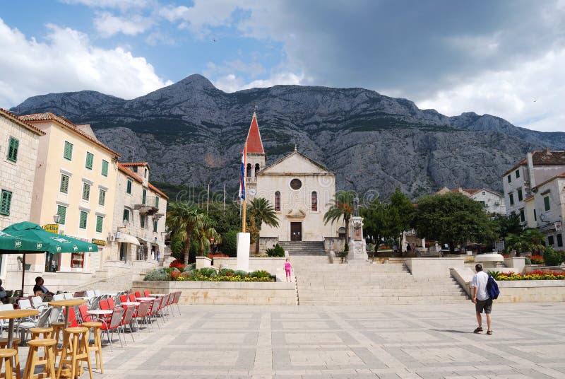 The view of the square in front of the church in the city of Makarska Riviera