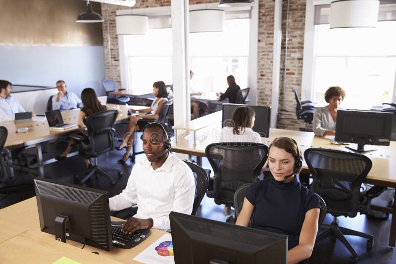 View Of Staff In Busy Customer Service Department