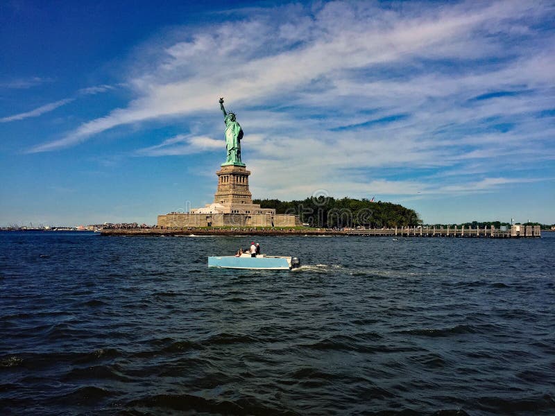 A View of the Statue of Liberty Across the Hudson River Stock Image