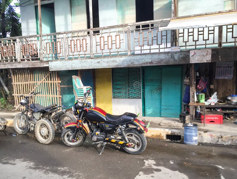Motorcycles on the street in Kalibo, Philippines. Philippines atm machine stock images, royalty-free photos and pictures