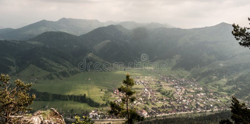 View to Hubova village with hills on the background from Havran hill in Velka Fatra mountains in Slovakia