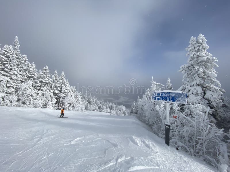 View to ski slopes with lot of fresh powder snow at Stowe Mountain resort VT in early December