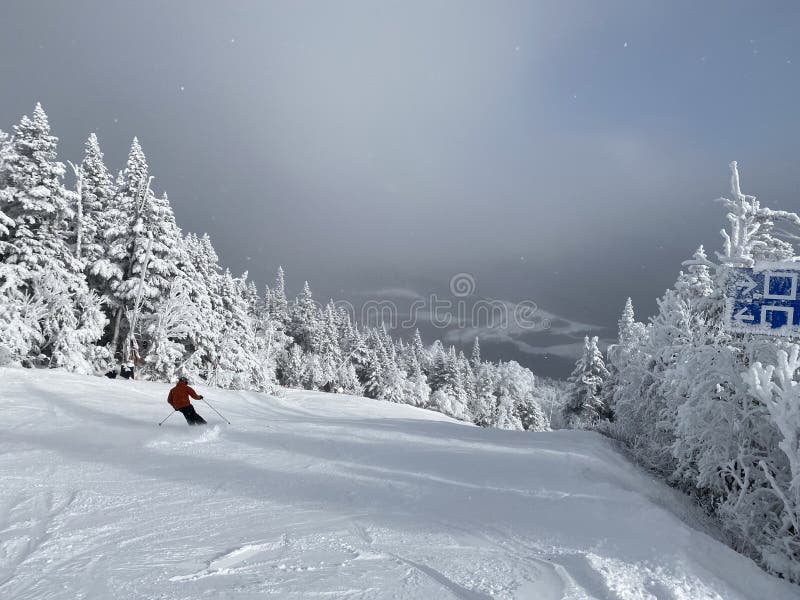 View to ski slopes with lot of fresh powder snow at Stowe Mountain resort VT in early December