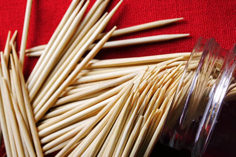 TOOTHPICKS in the OPENING of a TOPPLED GLASS JAR Stock Photo Image of