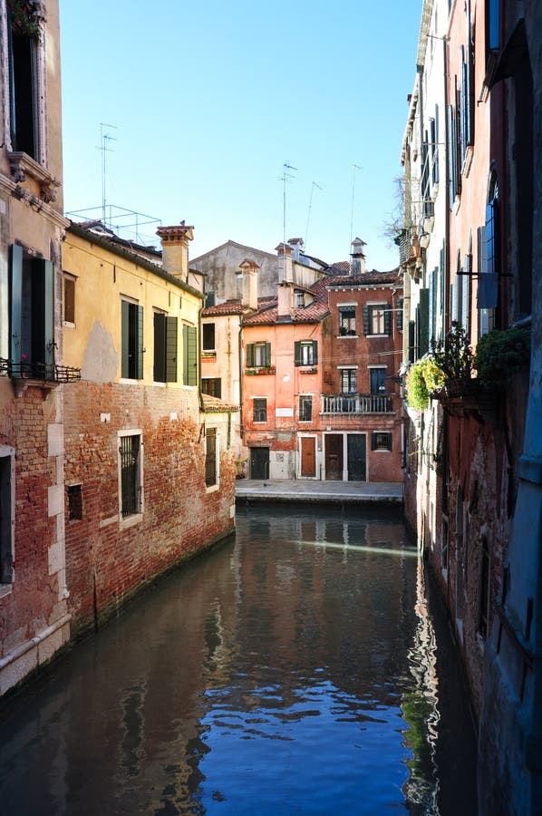 View of Venice Narrow Canal in Light and Shadow Stock Photo - Image of ...