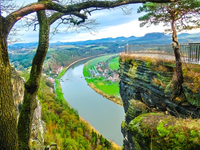 View from viewpoint of Bastei in Saxon Switzerland Germany to the town Wehlen and the river Elbe stock photos View from viewpoint of Bastei in Saxon Switzerland Germany to the town Wehlen and the river Elbe stock photos