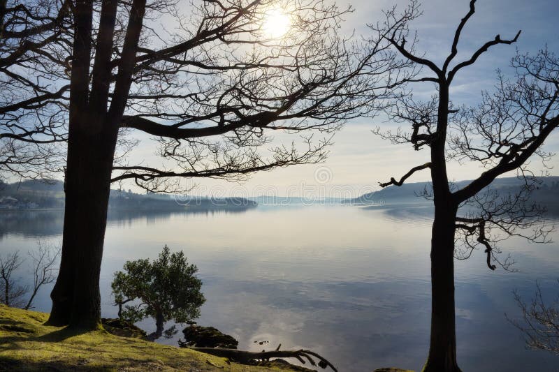 Lake Windermere framed by two trees