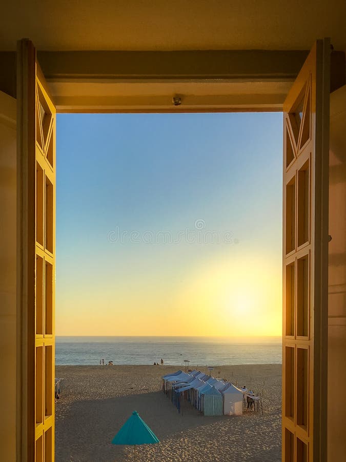 View from the window on the beach of Nazare stock photos View from the window on the beach of Nazare stock photos