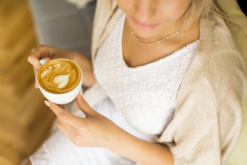 View of the Woman Drinking Coffee from a Cup Stock Image - Image of