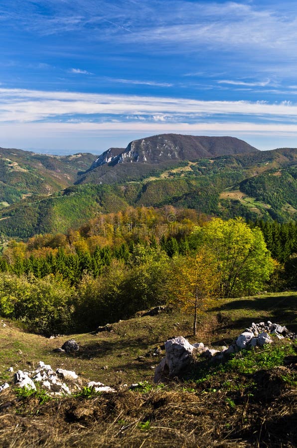 Viewpoint on a landscape of mount Bobija, hills, haystacks, meadows and colorful trees royalty free stock image Viewpoint on a landscape of mount Bobija, hills, haystacks, meadows and colorful trees royalty free stock image