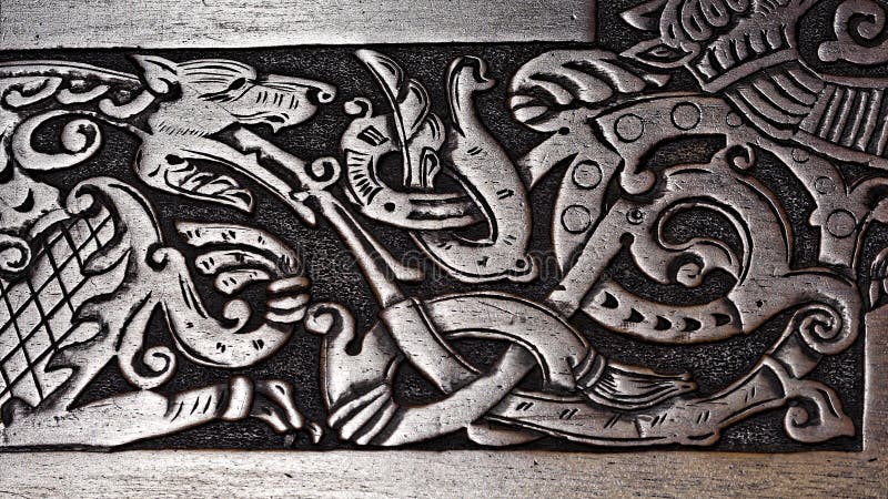 Viking wood carving of a wolf stock images