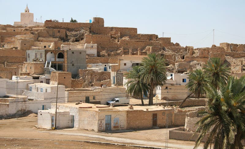 Village with old houses on the edge of desert Sahara in Tunisia. Village with old houses on the edge of desert Sahara in Tunisia